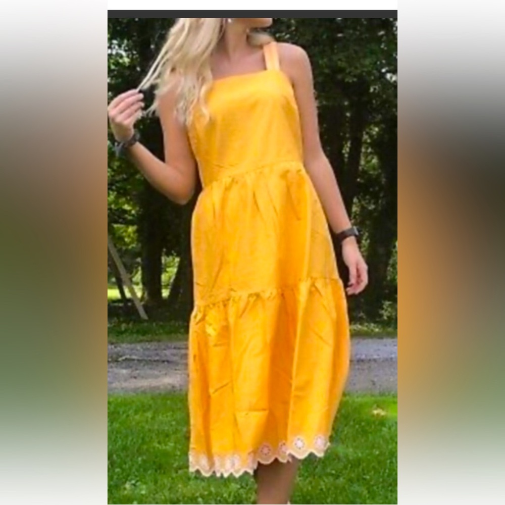 Bright marigold yellow maxi dress with embroidered detail